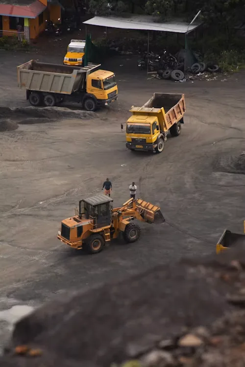 Heavy equipment and trucks on an active site