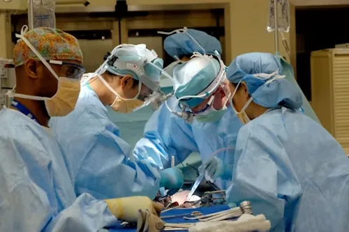A surgical team at work in an operating theatre